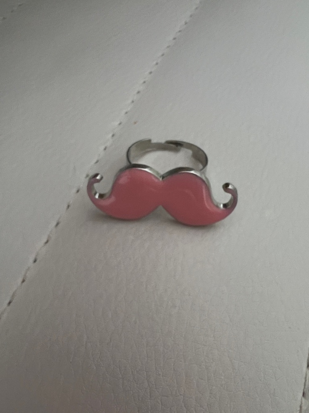 Adjustable moustache ring